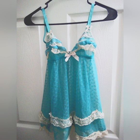 Blue laced dress lined with white lace lingerie - Picture 1 of 6